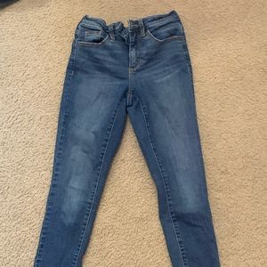 High rise skinny crop blue jeans.